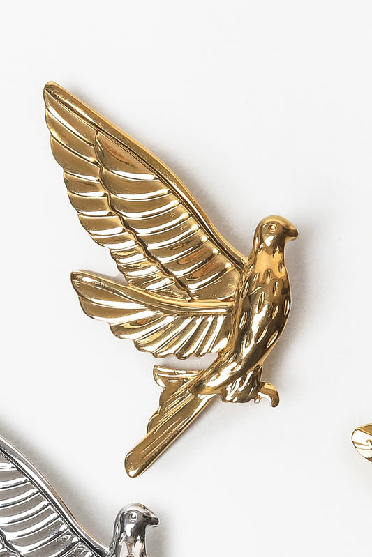 Broche élégante motif oiseau finition dorée ou argentée