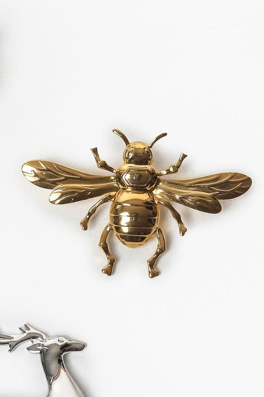 Broche abeille dorée raffinée